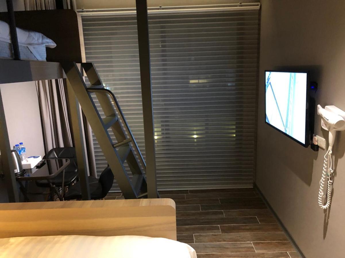 Kiwi Share Hotel Чжунли Экстерьер фото